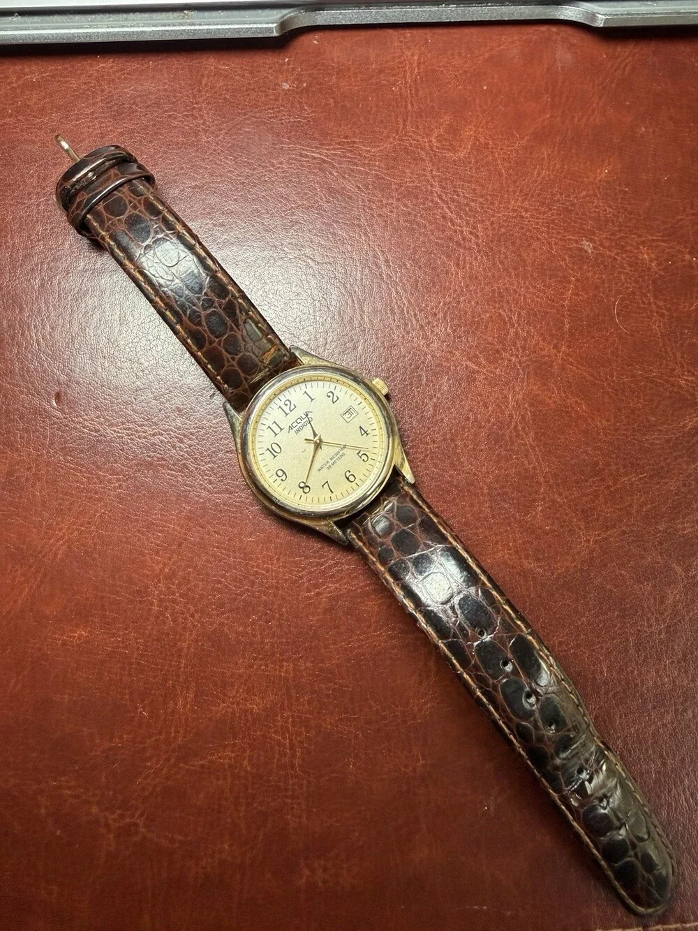 Accutime Indigo Gold Tone Quartz Watch Date 30M Brown Leather Band Needs Battery